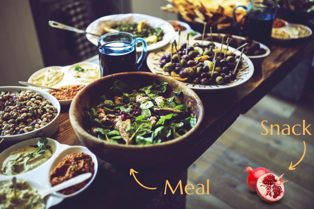 Compare a snack to a sit-down meal. Which Is more satisfying?